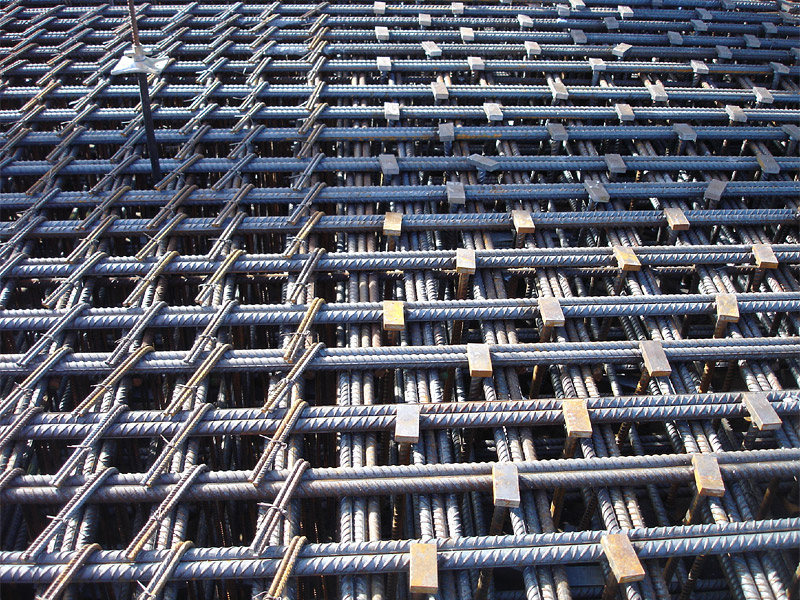 Two types of shear reinforcement for a slab